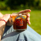 iechyd da glass, featuring Cuppy the Hard Lines Coffee Mascot.